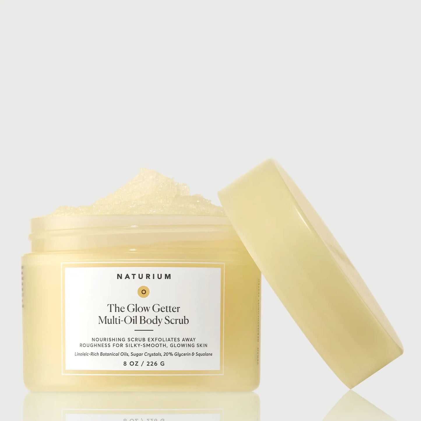 the-glow-getter-multi-oil-body-scrub-s2 NATR-40028-GlowGetter-Multi-Oil-Body-Scrub-Front-CapOff-bonebkgd.webp