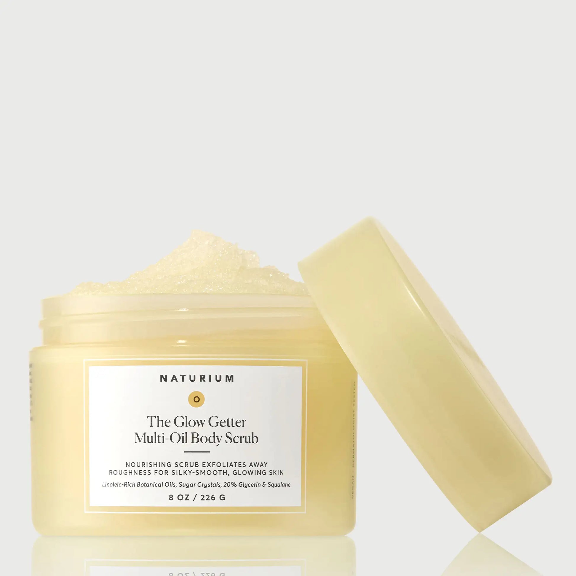 the-glow-getter-multi-oil-body-scrub-s2 NATR-40028-GlowGetter-Multi-Oil-Body-Scrub-Front-CapOff-bonebkgd.webp