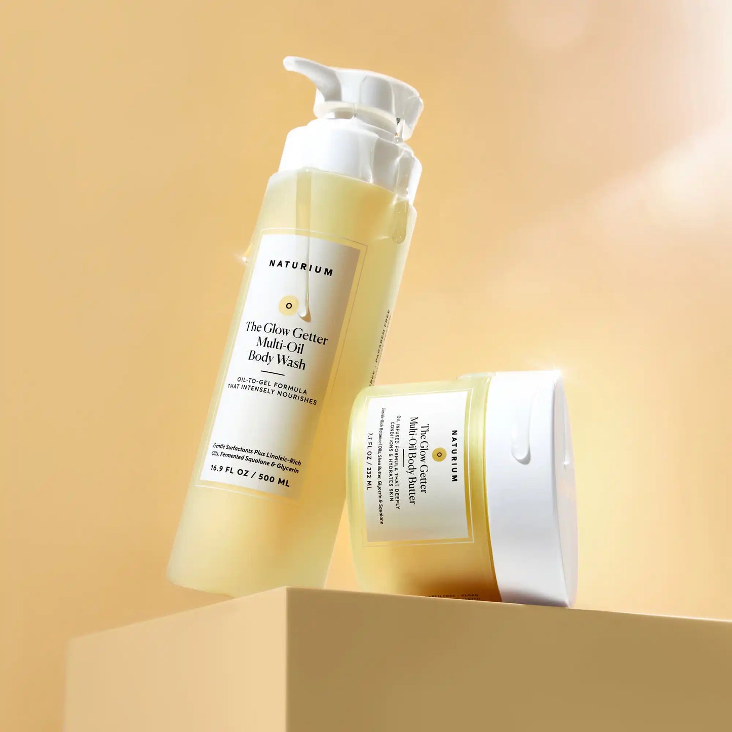 the-glow-all-out-body-bundle-z5 gg-bodybutter_1464-crop_revcolor_FL.webp